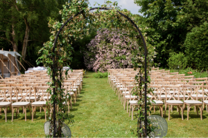 Outdoor Ceremony with floral arch